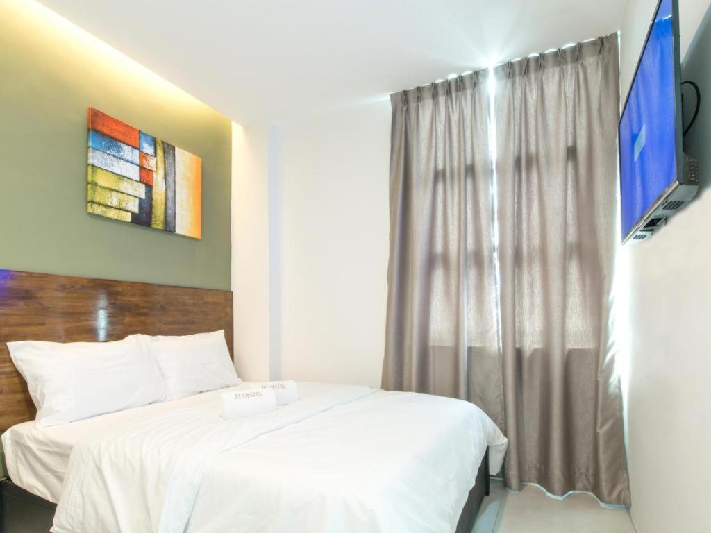 Econtel Queensbay Sungai Dua Bukit Екстер'єр фото
